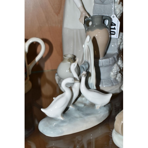 410 - FOUR LLADRO NAO FIGURINES, comprising 0136 'Girl At The Water Fountain, 1106 'Friendly Advice' (brok... 