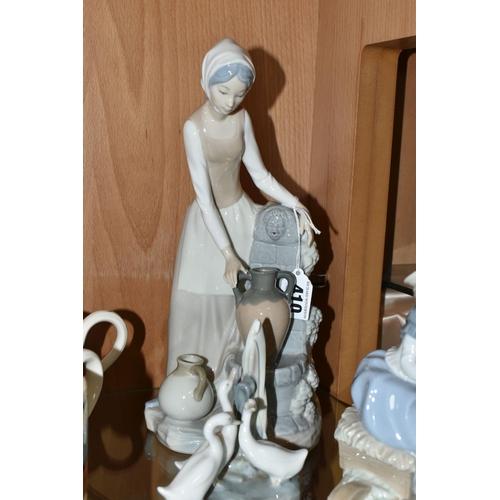 410 - FOUR LLADRO NAO FIGURINES, comprising 0136 'Girl At The Water Fountain, 1106 'Friendly Advice' (brok... 