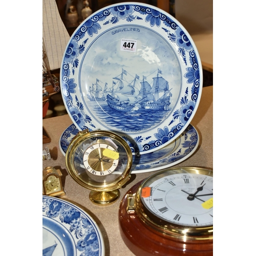 447 - A GROUP OF NAUTICAL CLOCKS AND WALL PLATES, comprising a Kevin Hughes ship's wall cock and barometer... 