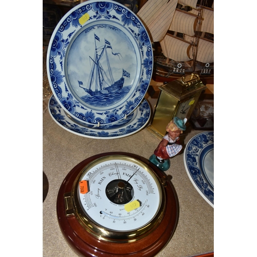 447 - A GROUP OF NAUTICAL CLOCKS AND WALL PLATES, comprising a Kevin Hughes ship's wall cock and barometer... 