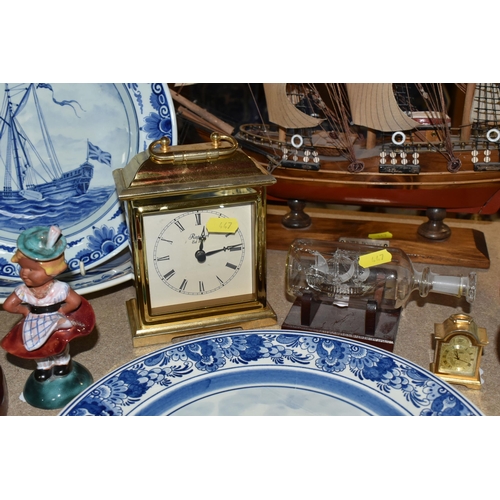 447 - A GROUP OF NAUTICAL CLOCKS AND WALL PLATES, comprising a Kevin Hughes ship's wall cock and barometer... 