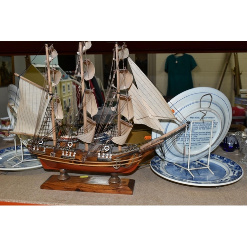 447 - A GROUP OF NAUTICAL CLOCKS AND WALL PLATES, comprising a Kevin Hughes ship's wall cock and barometer... 