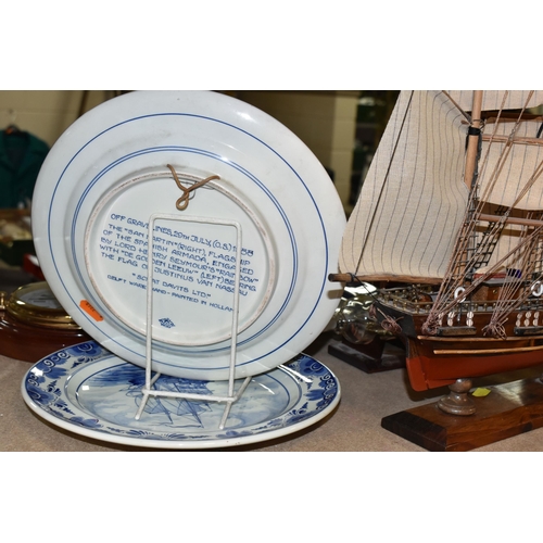 447 - A GROUP OF NAUTICAL CLOCKS AND WALL PLATES, comprising a Kevin Hughes ship's wall cock and barometer... 