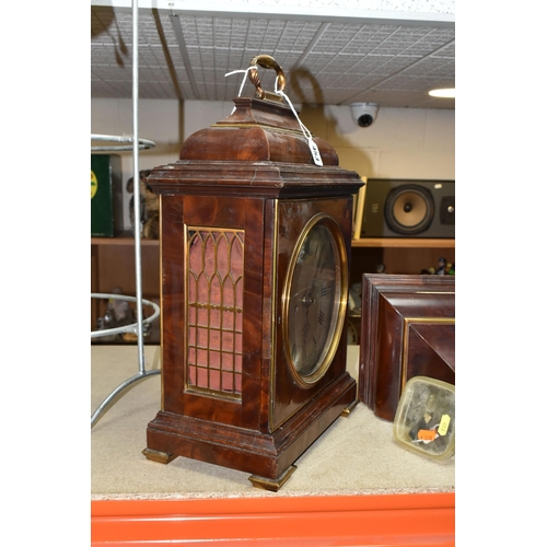 453 - A GEORGE III MAHOGANY AND BRASS MOUNTED BRACKET CLOCK AND BRACKET, the caddy top surmounted by a car... 