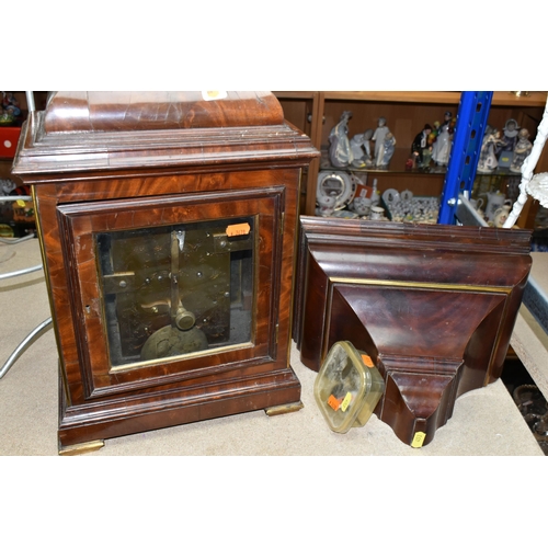 453 - A GEORGE III MAHOGANY AND BRASS MOUNTED BRACKET CLOCK AND BRACKET, the caddy top surmounted by a car... 