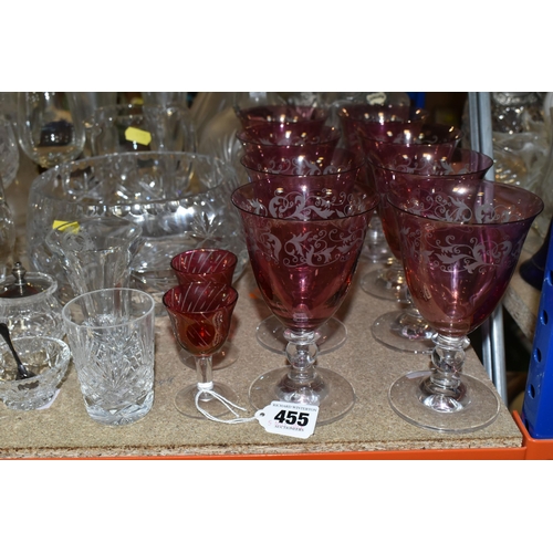 455 - A QUANTITY OF GLASSWARE, to include a set of eight acid etched cranberry wine glasses, three decante... 