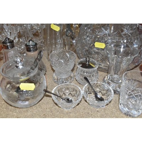 455 - A QUANTITY OF GLASSWARE, to include a set of eight acid etched cranberry wine glasses, three decante... 