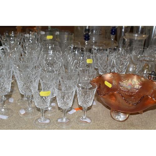 455 - A QUANTITY OF GLASSWARE, to include a set of eight acid etched cranberry wine glasses, three decante... 