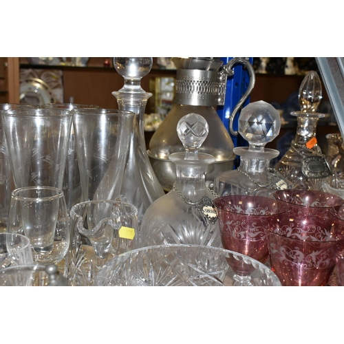 455 - A QUANTITY OF GLASSWARE, to include a set of eight acid etched cranberry wine glasses, three decante... 