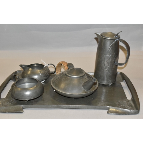 468 - AN ARTS AND CRAFTS SOLKETS ENGLISH PEWTER FIVE PIECE TEA SET,  designed by Archibald Knox for Libert... 