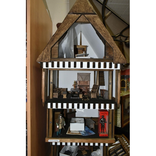 471 - A FOUR STOREY TUDOR WOODEN DOLLS HOUSE, made by Robert Stubbs, model no. F1, detachable magnetic fro... 