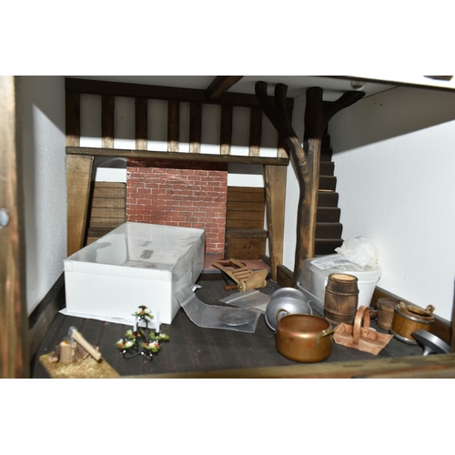 471 - A FOUR STOREY TUDOR WOODEN DOLLS HOUSE, made by Robert Stubbs, model no. F1, detachable magnetic fro... 