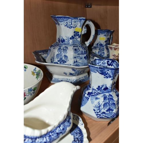 473 - A GROUP OF MASON'S IRONSTONE JUGS, comprising a blue and white 'Willow' pattern pitcher (cracked), a... 