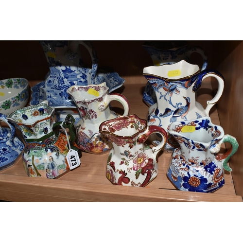 473 - A GROUP OF MASON'S IRONSTONE JUGS, comprising a blue and white 'Willow' pattern pitcher (cracked), a... 