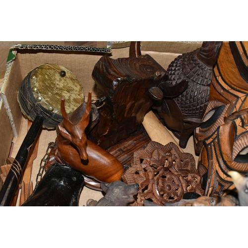 484 - A BOX OF WOODEN WORLDWIDE TOURIST ITEMS AND SIMILAR, to include four decorative masks in different s... 