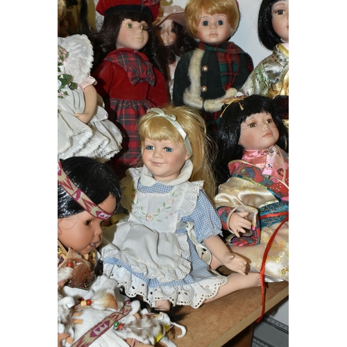 486 - A GROUP OF COLLECTORS DOLLS, sixteen male and female dolls, including pairs of Japanese style and Na... 