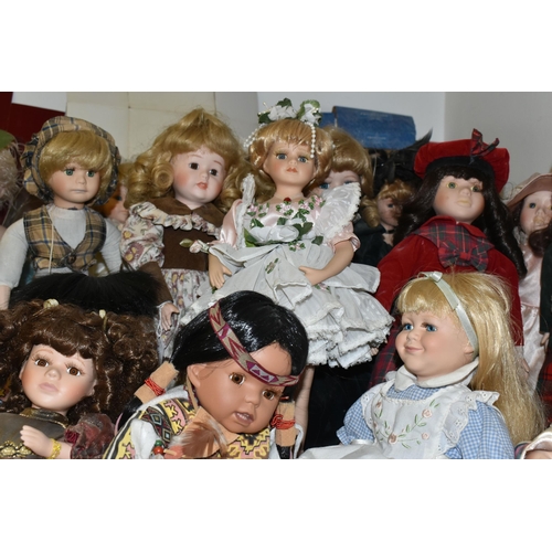 486 - A GROUP OF COLLECTORS DOLLS, sixteen male and female dolls, including pairs of Japanese style and Na... 