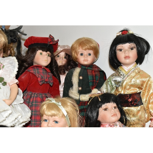 486 - A GROUP OF COLLECTORS DOLLS, sixteen male and female dolls, including pairs of Japanese style and Na... 