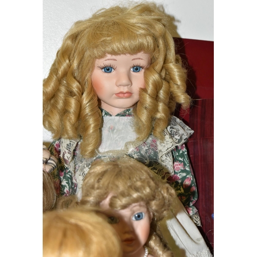 487 - A GROUP OF COLLECTORS DOLLS, seventeen male and female dolls, including pairs of Victorian style and... 