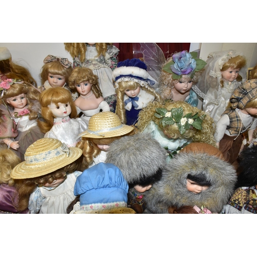 487 - A GROUP OF COLLECTORS DOLLS, seventeen male and female dolls, including pairs of Victorian style and... 