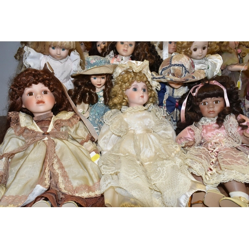 488 - A GROUP OF COLLECTORS DOLLS, fifteen female dolls, including two brides and dolls in historical cost... 