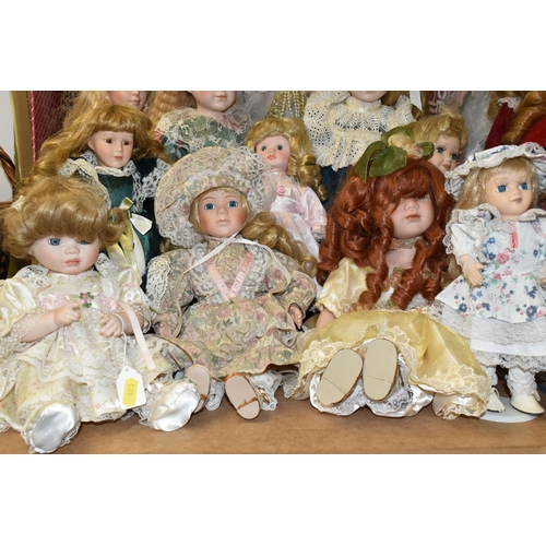 493 - A GROUP OF COLLECTORS DOLLS, fourteen female dolls, including dolls in historical costume, various m... 