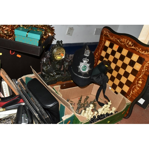 496 - THREE BOXES AND LOOSE SUNDRY ITEMS, to include a chess table (legs detached), and two sets of chess ... 