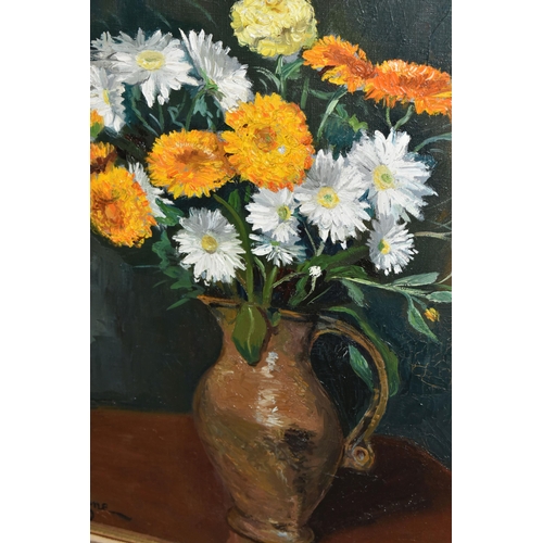 504 - A 20TH CENTURY STILL LIFE STUDY OF FLOWERS IN A VASE, signed Bretagne bottom left, oil on canvas, ap... 