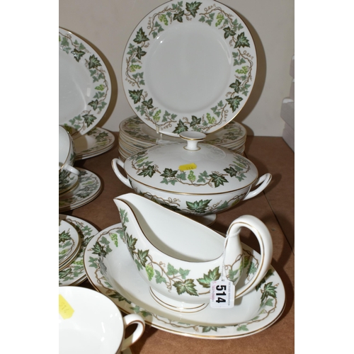 514 - A WEDGWOOD 'SANTA CLARA' PATTERN DINNER SET, comprising a twin handled covered tureen, three oval me... 