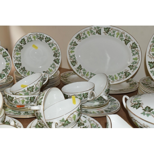 514 - A WEDGWOOD 'SANTA CLARA' PATTERN DINNER SET, comprising a twin handled covered tureen, three oval me... 