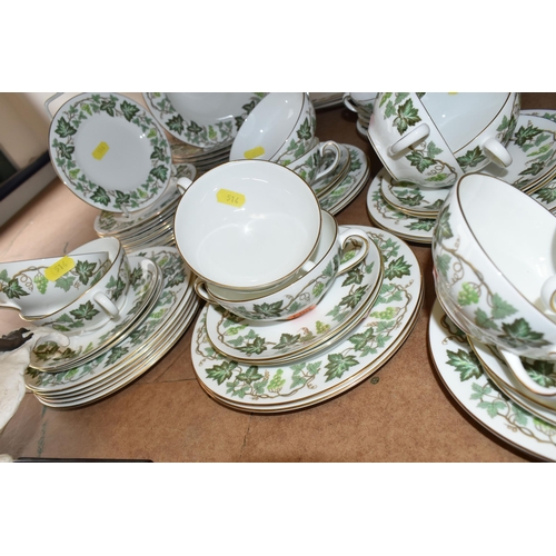 514 - A WEDGWOOD 'SANTA CLARA' PATTERN DINNER SET, comprising a twin handled covered tureen, three oval me... 