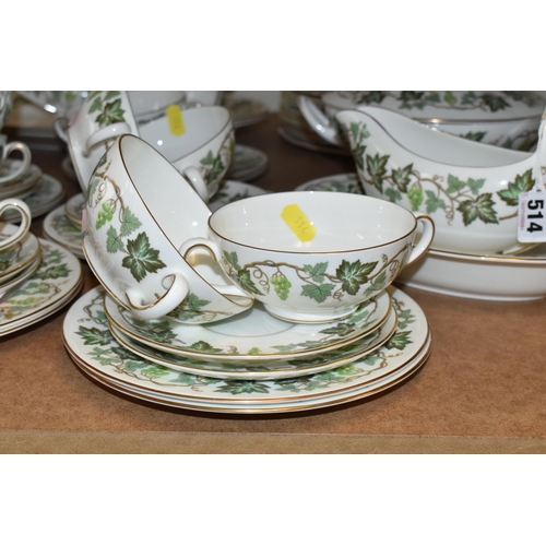 514 - A WEDGWOOD 'SANTA CLARA' PATTERN DINNER SET, comprising a twin handled covered tureen, three oval me... 