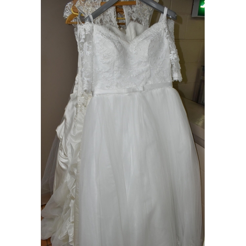 542 - TEN WEDDING DRESSES, retail stock clearance, a collection of styles including Princess line, Mermaid... 