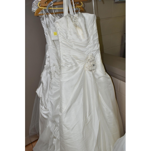 542 - TEN WEDDING DRESSES, retail stock clearance, a collection of styles including Princess line, Mermaid... 