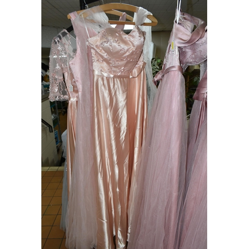 543 - A GROUP OF TWENTY ONE COLOURED BRIDESMAID/WEDDING DRESSES, retail clearance, three blush pink, two p... 