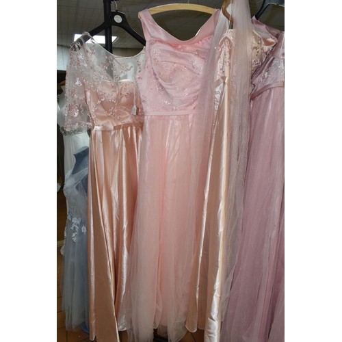 543 - A GROUP OF TWENTY ONE COLOURED BRIDESMAID/WEDDING DRESSES, retail clearance, three blush pink, two p... 