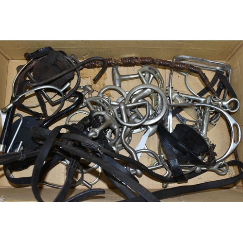 549 - ONE BOX OF LEATHER HORSE BRIDLES, STIRRUPS, BITS AND WHIPS, to include solid nickel bits, maker's na... 