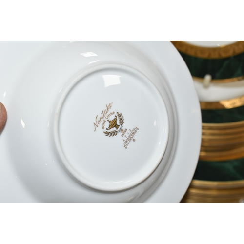 551 - A NORITAKE FITZGERALD 4712 PATTERN DINNER SET, ivory coloured ground with a gold gilt and dark green... 