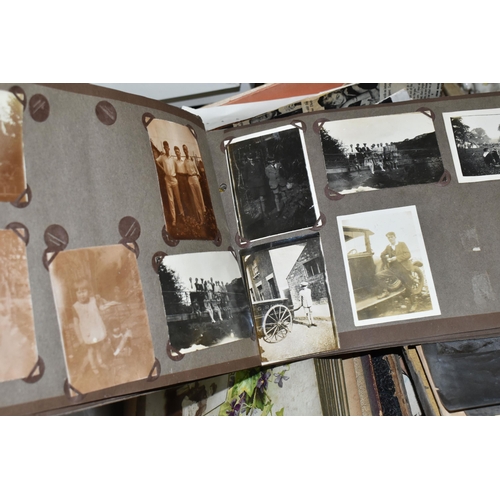 553 - TWO BOXES OF EPHEMERA to include a large collection of early-mid 20th century family photographs and... 