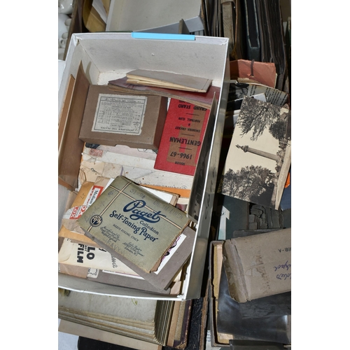 553 - TWO BOXES OF EPHEMERA to include a large collection of early-mid 20th century family photographs and... 