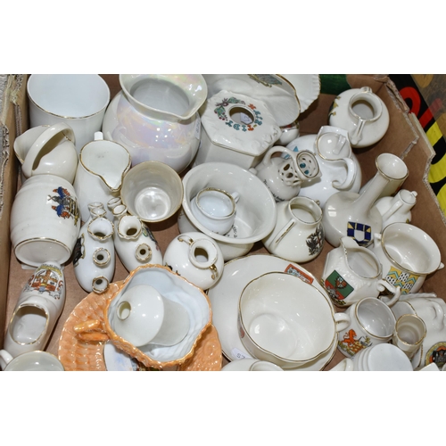 554 - A QUANTITY OF CRESTED WARE, to include an assortment of miniature pots, jars and vases, maker's name... 