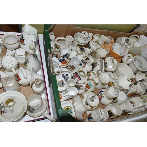 554 - A QUANTITY OF CRESTED WARE, to include an assortment of miniature pots, jars and vases, maker's name... 