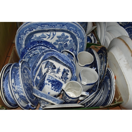 556 - FOUR BOXES OF EARLY 20TH CENTURY BLUE AND WHITE CERAMICS, comprising a large quantity of plates, mea... 