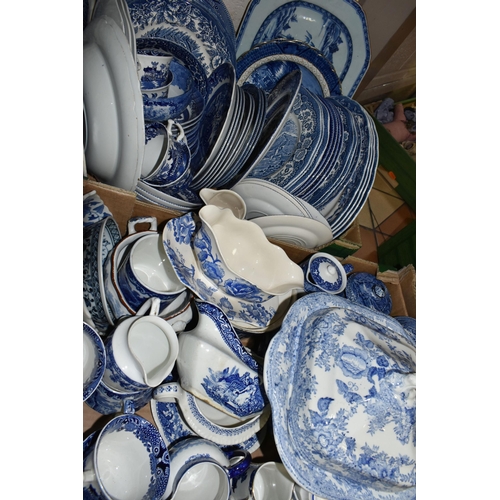 556 - FOUR BOXES OF EARLY 20TH CENTURY BLUE AND WHITE CERAMICS, comprising a large quantity of plates, mea... 