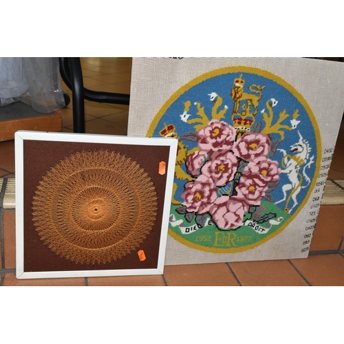 557 - A COLLECTION OF FRAMED TAPESTRY WORK, comprising classic 1970's designs, two working frames, an oval... 