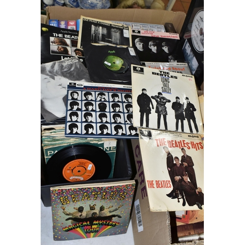 560 - TWO TRAYS AND A CASE CONTAINING LPs, SINGLES CDs AND VHS TAPES FROM THE BEATLES AND CONTRIBUTING ART... 