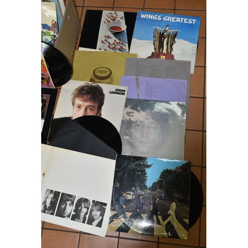 560 - TWO TRAYS AND A CASE CONTAINING LPs, SINGLES CDs AND VHS TAPES FROM THE BEATLES AND CONTRIBUTING ART... 