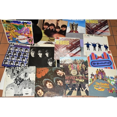 560 - TWO TRAYS AND A CASE CONTAINING LPs, SINGLES CDs AND VHS TAPES FROM THE BEATLES AND CONTRIBUTING ART... 