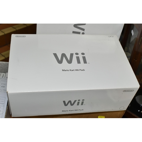 563 - NINTENDO WII BUNDLE, includes the Nintendo Wii console boxed, Wii Fit Plus and Balance Board boxed, ... 