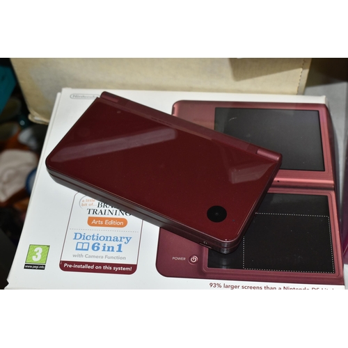 565 - NINTENDO DSI XL BOXED AND QUANTITY OF GAMES, games include Legend of Zelda Spirit Tracks, Brain Trai... 